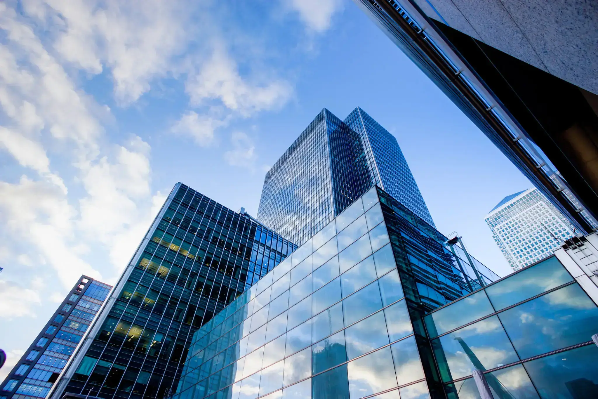 Skyscrapers against a bright blue sky.